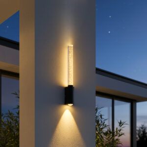 Modern outdoor 6W LED wall light with bubble design, glowing warm light on a grey villa wall at night
