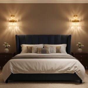A beautifully lit, ornate crystal and gold wall sconce with an E14 bulb holder