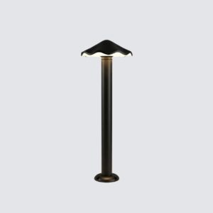 Elegant dark grey LED outdoor bollard pathway light with mushroom-style cap illuminating 3000K a stone garden walkway at twilight