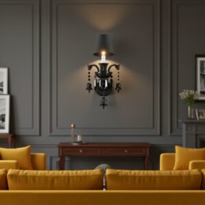 Elegant black crystal wall lamp with three lights and dark shades on a classic brown living room wall, featuring a decorative fireplace and armchair.