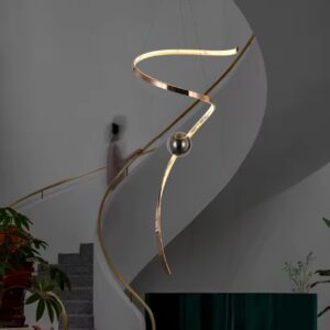 Modern spiral LED pendant light for high ceilings with metallic finish and spherical accents in a contemporary home foyer