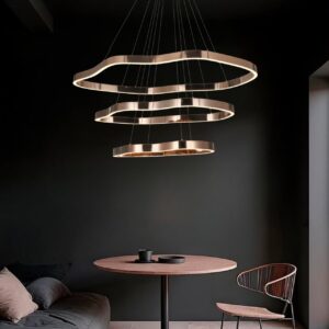 LED pendant light over a round wooden table in a modern dining room 3 light color